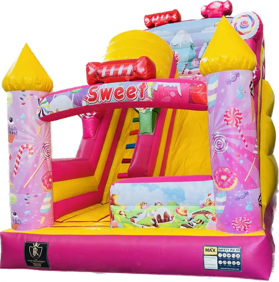 Pink and yellow candy themed jumping castle with a slide